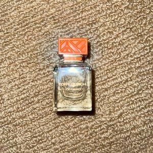 Tory Burch .24 fl oz knock on wood